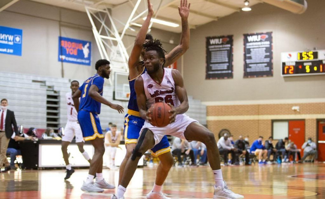 Godsgift "GG" Ezedinma playing basketball at UIW