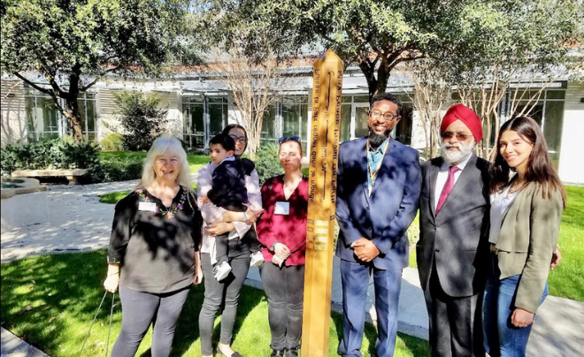 Social Justice Leadership students, G.P. Singh and Sister Martha Ann Kirk 