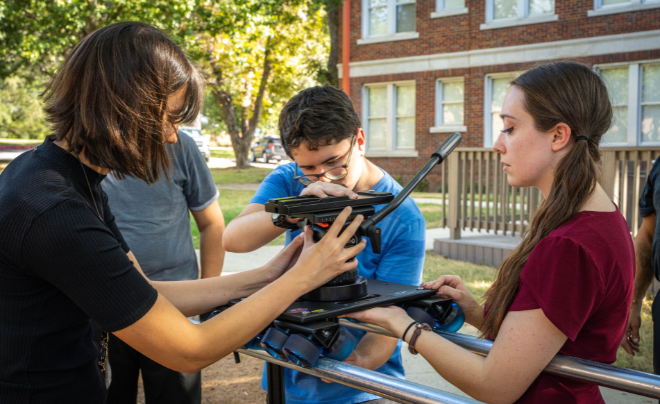 UIW students working on film equipment