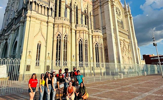 students in front of chapel